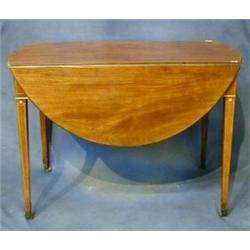 A Georgian mahogany Pembroke table fitted a drawer raised on square tapering supports ending in b...