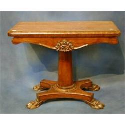 A William IV mahogany card table raised on column supports with triform base and paw feet 36" £40...