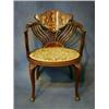 Image 1 : A late Victorian mahogany pierced tub back open arm chair inlaid an urn with fruit on cabriole su...
