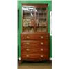 Image 1 : A Georgian mahogany secretaire bookcase, the upper section with moulded cornice, the interior fit...