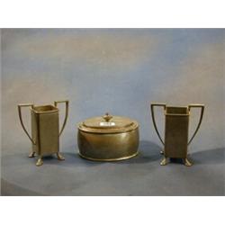 A Tudric oval  planished pewter caddy 5", the base marked 01566 and a pair of Civic pewter twin h...