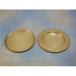 A Tudric planished pewter salver base marked 01289 11" and a circular Homeland pewter salver base...