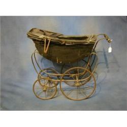 A childs Victorian style perambulator £100-150...