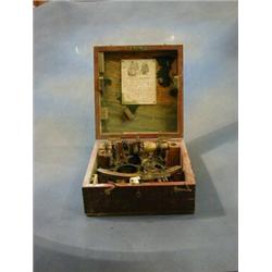 A Japanned metal sextant by Henry Hughes & Sons Ltd, boxed and with certificate £100-150...