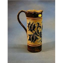 An Art Nouveau Doulton Lambeth stoneware jug, the base impressed Doulton Lambeth TTT Art Union Lo...