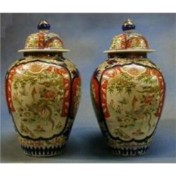 A pair of 19th Century Japanese Imari porcelain vases and covers 14" £375-475...