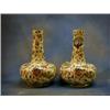 Image 1 : A pair  Zsolnay bottle vases 15" with floral and peacock decoration against a cream ground, print...