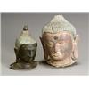 Image 1 : Two Southeast Asian Heads of the Buddha The first, a Thai red and black lacquered composition,...