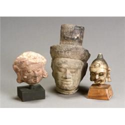 Group of Three Indian Stone Heads of the Buddha 10th-15th Century Including one Khmer sa...