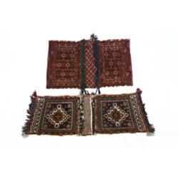 Two Turkoman Saddle Bags Circa 1950 The first with blue ground and rosette field centering...