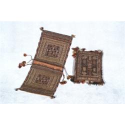 Turkoman Saddle Bag and a Pillow Post 1950 The bag with two mats, each with red ground with...