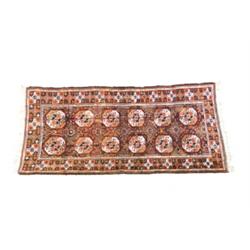 Shiraz Rug Post 1950 Brown ground with two vertical rows of six guls within a rosette guard...