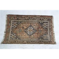 Shiraz Rug Post 1950 Brown ground with rosette and leafage field centering a stepped diamon...