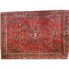 Image 1 : Sarouk Rug Second Quarter 20th Century Red ground with floral spray field within a rosette...