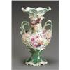 Image 1 : English Floral Encrusted Porcelain Mantel Vase Mid-19th Century The bulbous body flanked by...