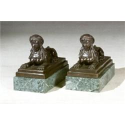 Pair of Continental Bronze Figures of Sphinx Modern Each raised on a green marble base. ...