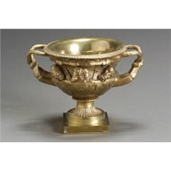 Louis XVI Style Ormolu Two-Handled Urn 20th Century Cast with grape leaves, classical heads...