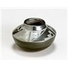 Image 1 : San Ildefonso Blackware Jar Cusencu, Mid-20th Century The shoulder of the bulbous body deco...
