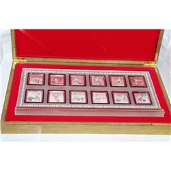 12 PIECE YEAR OF RABBIT ELECTROPLATED COIN SET