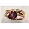 Image 1 : #32-10K GOLD GARNET & DIAMOND (0.15CT) RING