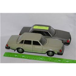 SET OF TWO COLLECTIBLE TOY VOLVOS - MADE IN FINLAND