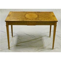 Skrivbord i björk med intarsia i olika träslag, mässingsavslut på ben, H 72, 66x110 fanerskador....