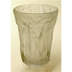 A Lalique vase, of slightly flaring form, moulded with tall branching trees, etched signature to...