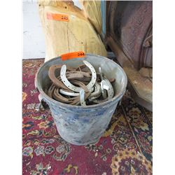 Bucket of used horseshoes