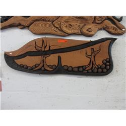 Carved wood wall plaque of a forest