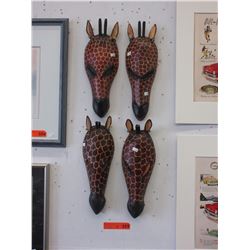 4 Carved wood giraffe masks