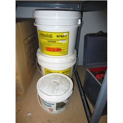 Pails of Duradeck & stucco repair