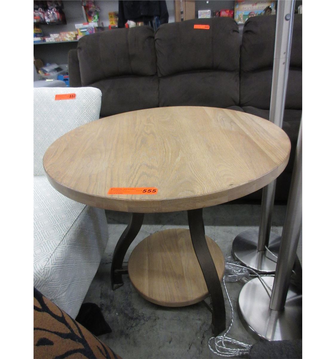 Round wood accent table with metal legs