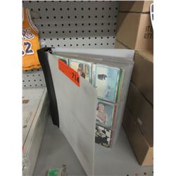 Binder of assorted trading cards
