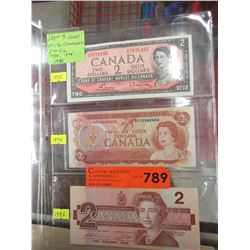 3 Canadian $2 banknotes