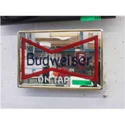 Electric mirrored Budweiser sign