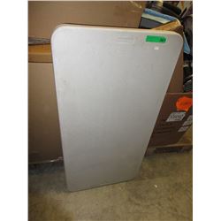 Used resin folding table