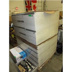 Skid of used office desk drawers