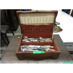 Cutlery box containing assorted cutlery