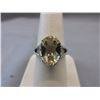 Image 1 : Oval Checkerboard Cut Citrine & Diamond Ring