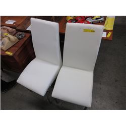Pair of new white dining chairs with chrome legs