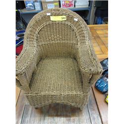 Child sized wicker arm chair - used