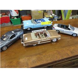 4 Scale model cars - used