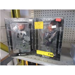 2 "Men of the Ice" figurines