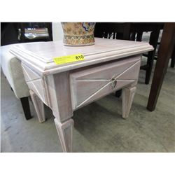 Pink end table with drawer
