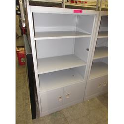 Metal storage shelf with lockable doors in base