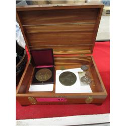 Vintage wood box with bronze medallions