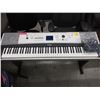 Image 1 : Yamaha electric keyboard - used