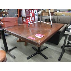 Wood top restaurant table with metal base - used