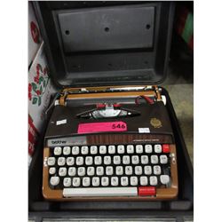Vintage - Brother portable typewriter with case
