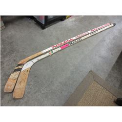 2 Used hockey sticks